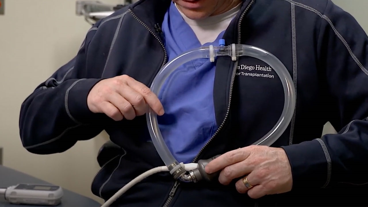 Dr. Eric Adler with a ventricular assist device (VAD)